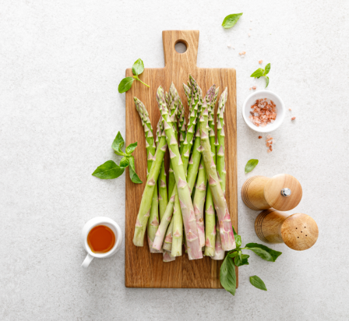 asparagus-cooking-bunch-of-asparagus-on-kitchen-ta-PFTZ6C9
